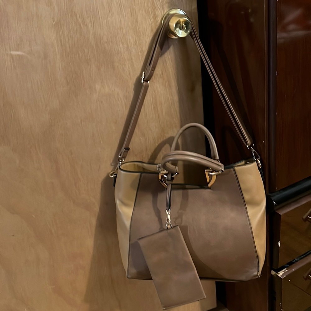 Brown and tan handbag with attached small bag